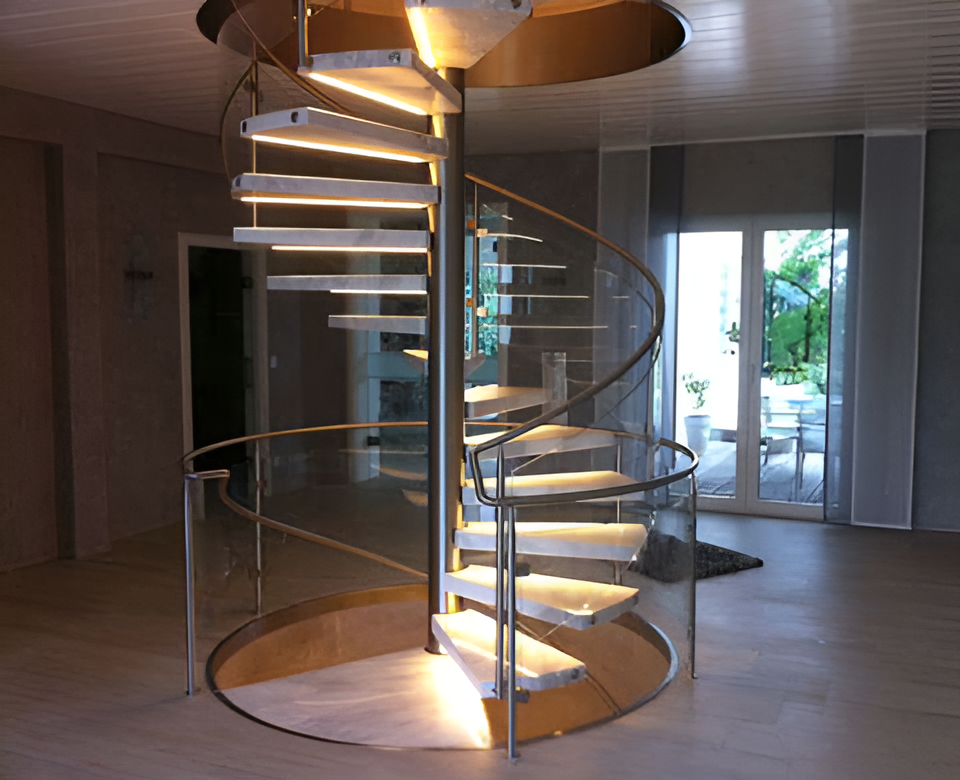 Spiral staircase with glass railing and integrated lighting in a modern interior